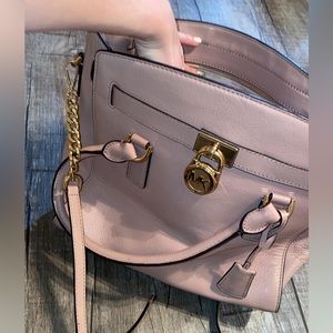 Michael Kors- Has crossbody strap as well. Dust bag included.